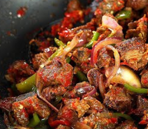 Asun (Spicy Roast Goat) By Sisi Yemmie