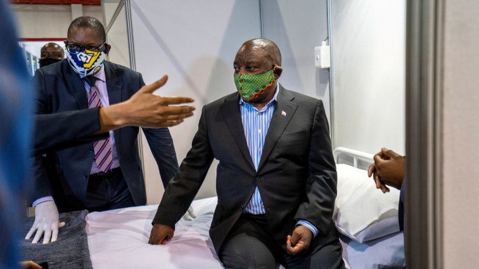 President Cyril Ramaphosa sitting on hospital bed. South Africa is battling COVID-19 second wave