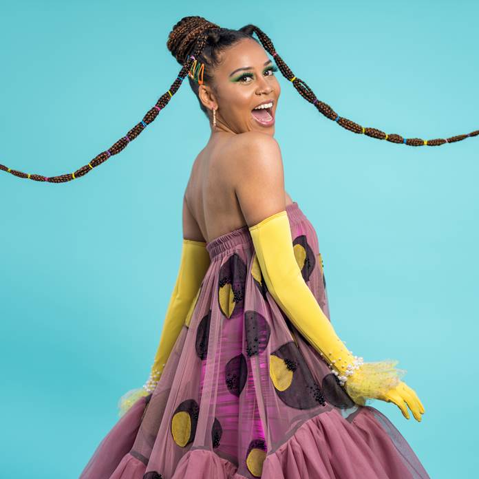 Sho Madjozi rocking it in an off-the shoulder gown