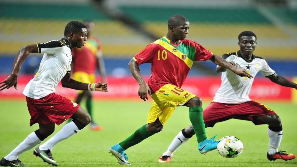 Djibril Fandje Toure playing for Guinea