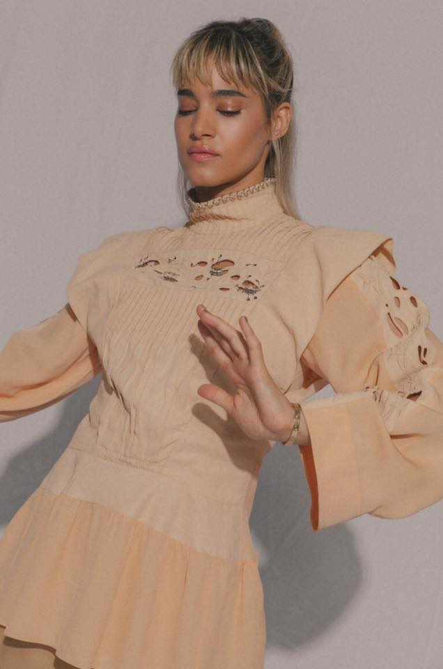 Sofia Boutella stylish beige top