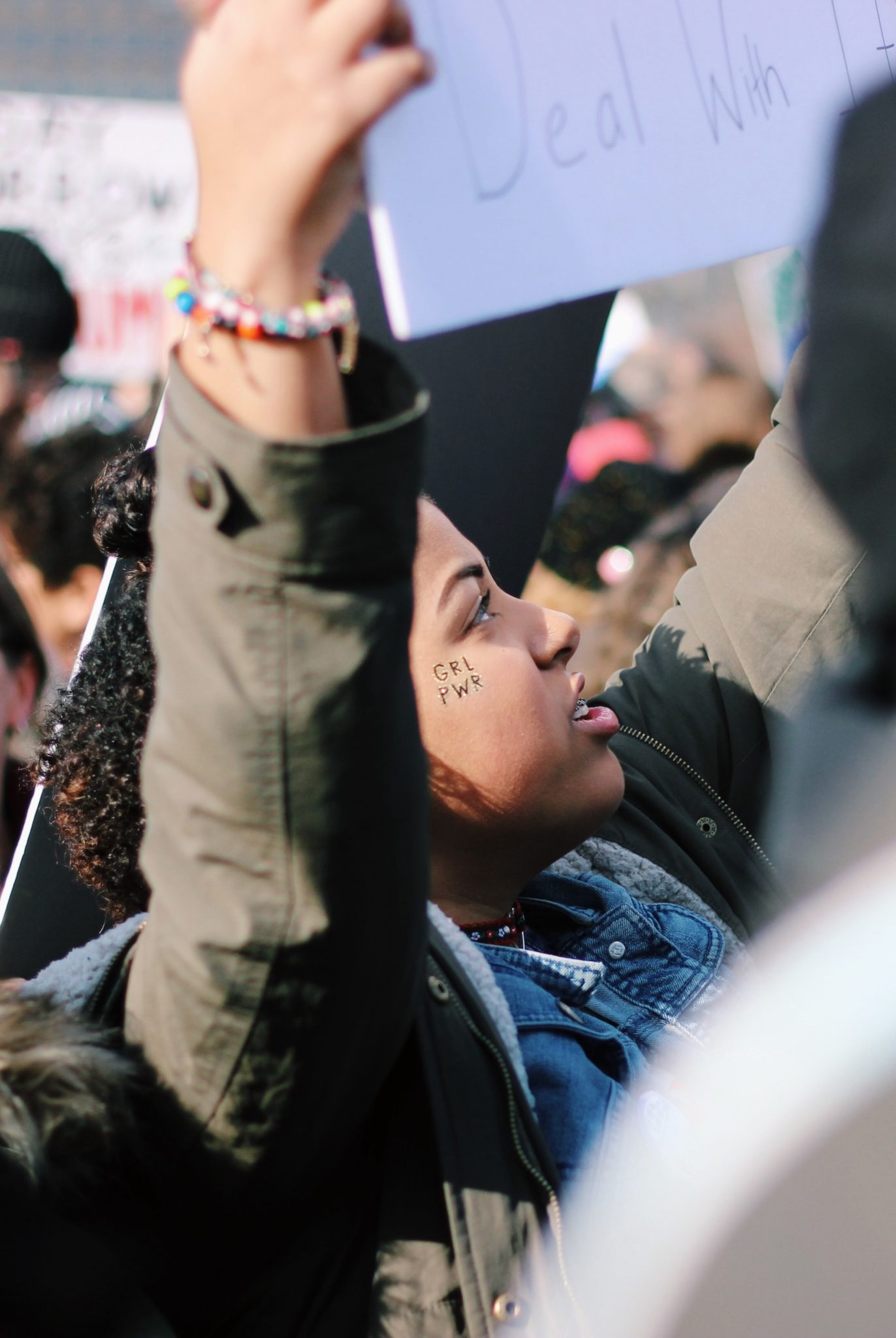 Women holding a placard at an women rights protest