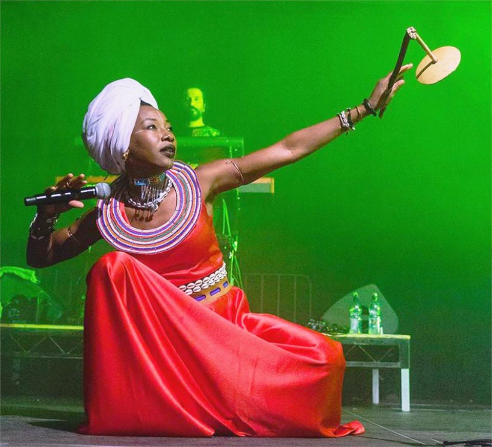 Fatoumata resplendant in red