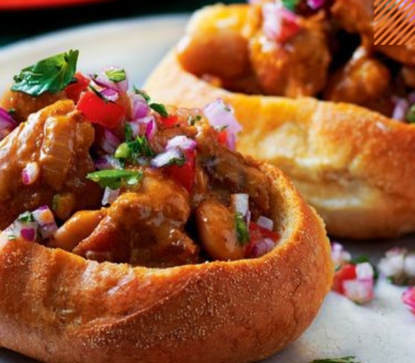 Bunny chow (chicken curry rolls) By Delicious