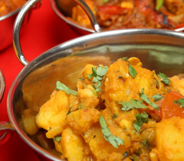 Ugandan Curry Potatoes are a popular and easy to make Ugandan side dish.  Serve it hot with grilled chicken or a meat stew.  The spiciness of this dish is a perfect contrast to a sweeter marinade.
