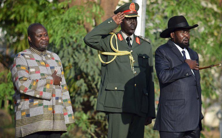 President Salva Kiir (right) with opposition leader Riek Machar (left) during the searing in of the vice in Juba on April 2016 (Photo credit: Reuters)